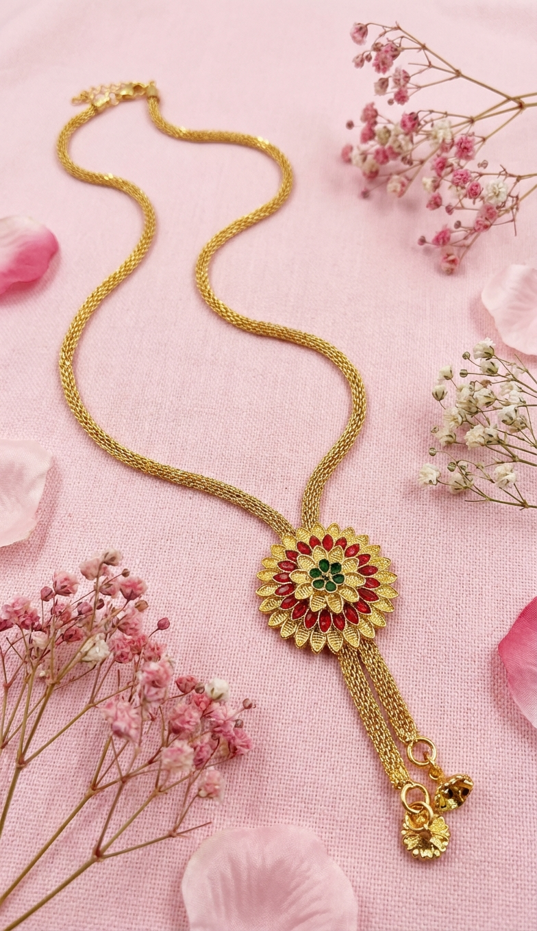 Flat lay of floral pendant necklace with roses